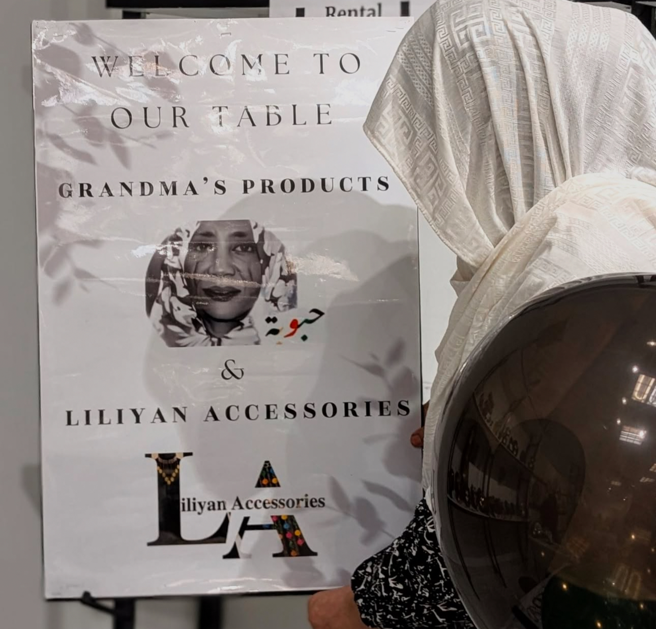 Woman admiring an event banner
